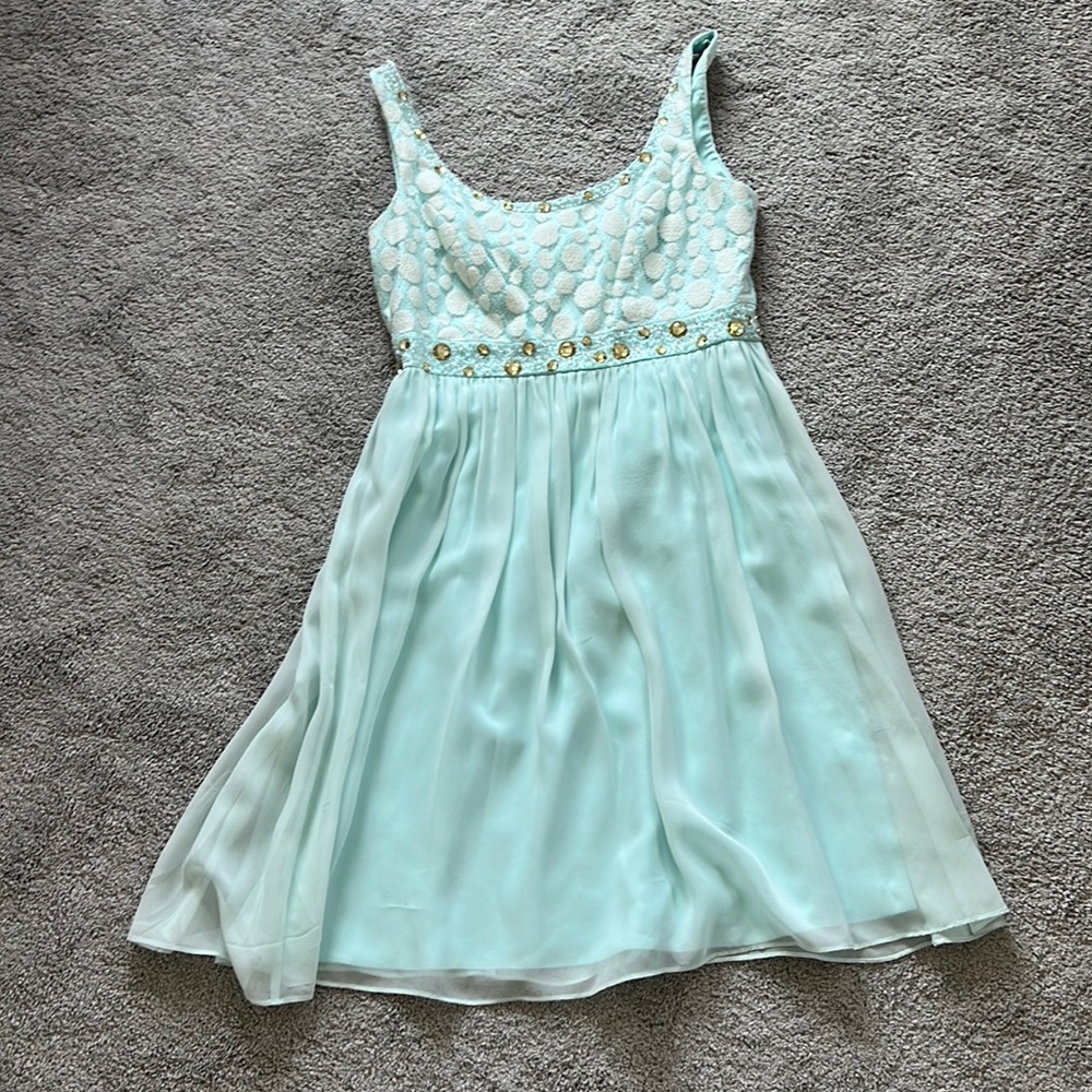 Cute blue dress. Would be great for a wedding guest.